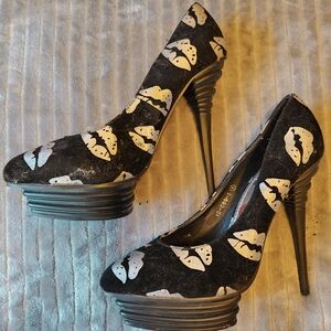 Platform spike heel silver lip pumps